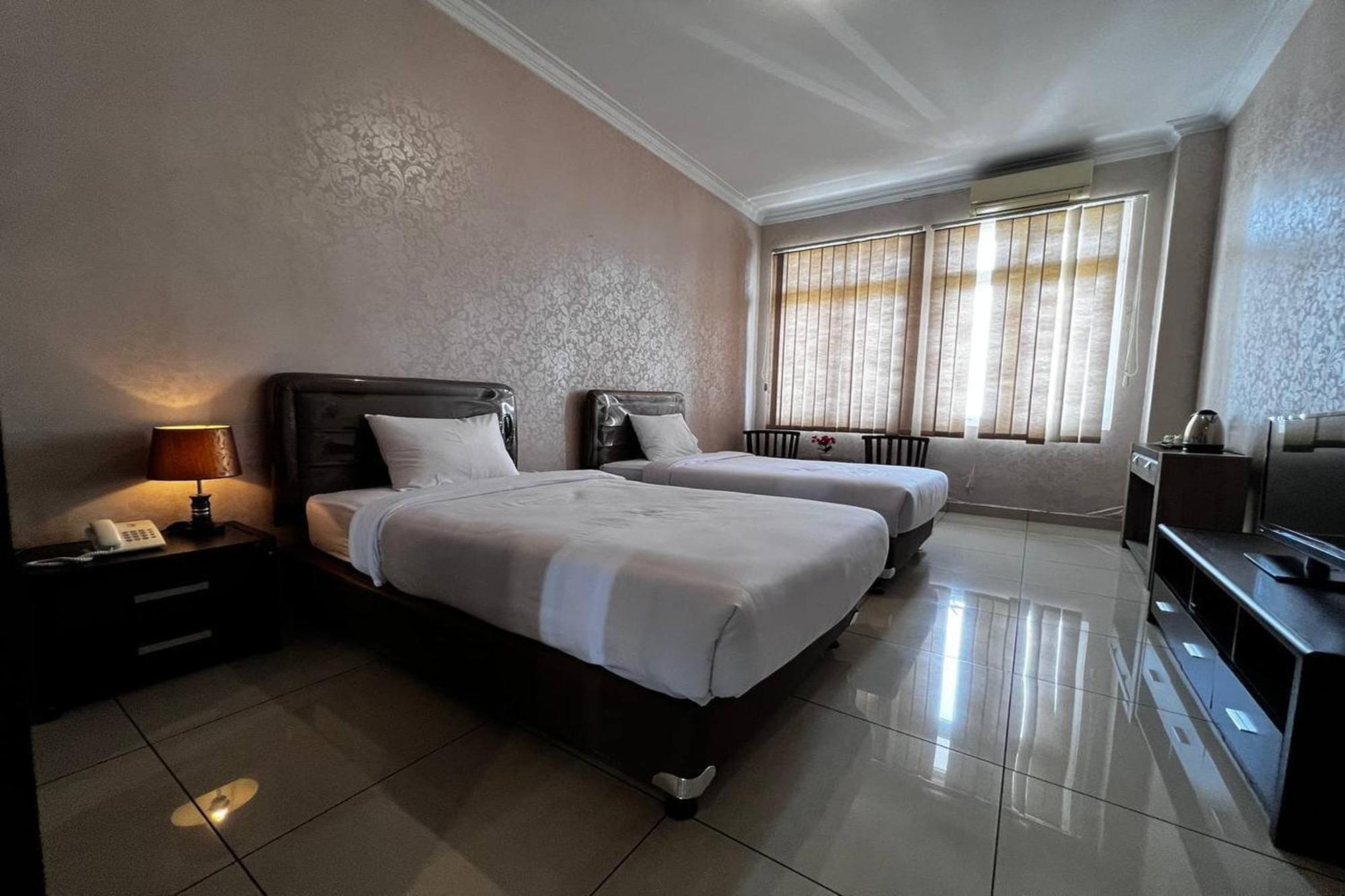 Ohulu Guesthouse Medan Bagian luar foto